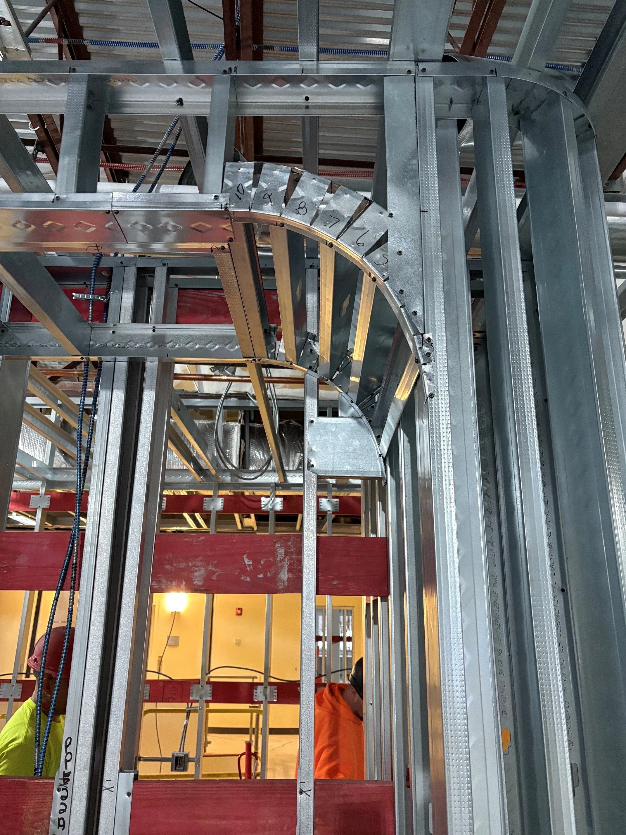 Interior metal framing with radius and blocking.