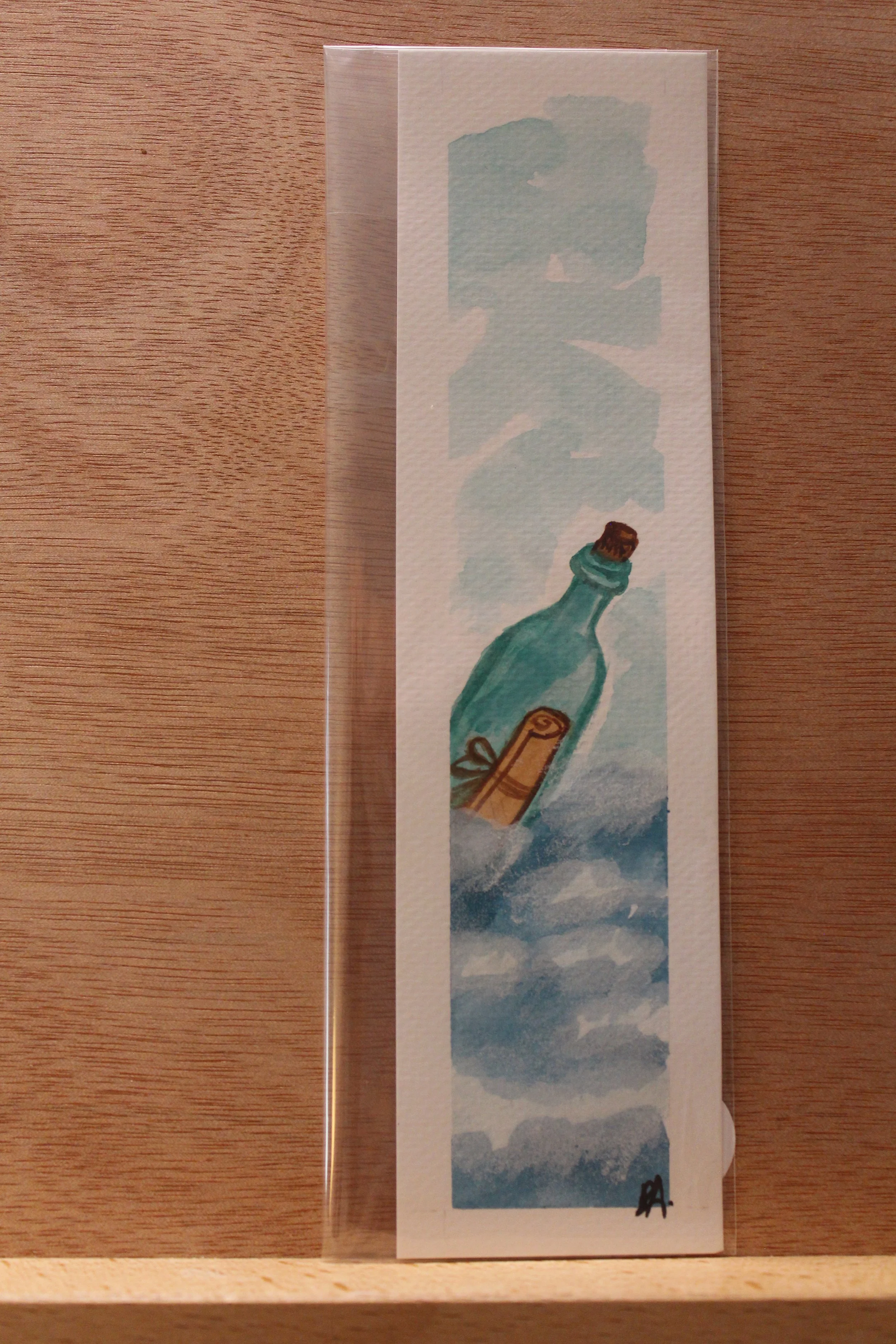Buchzeichen Flaschenpost im Meer
