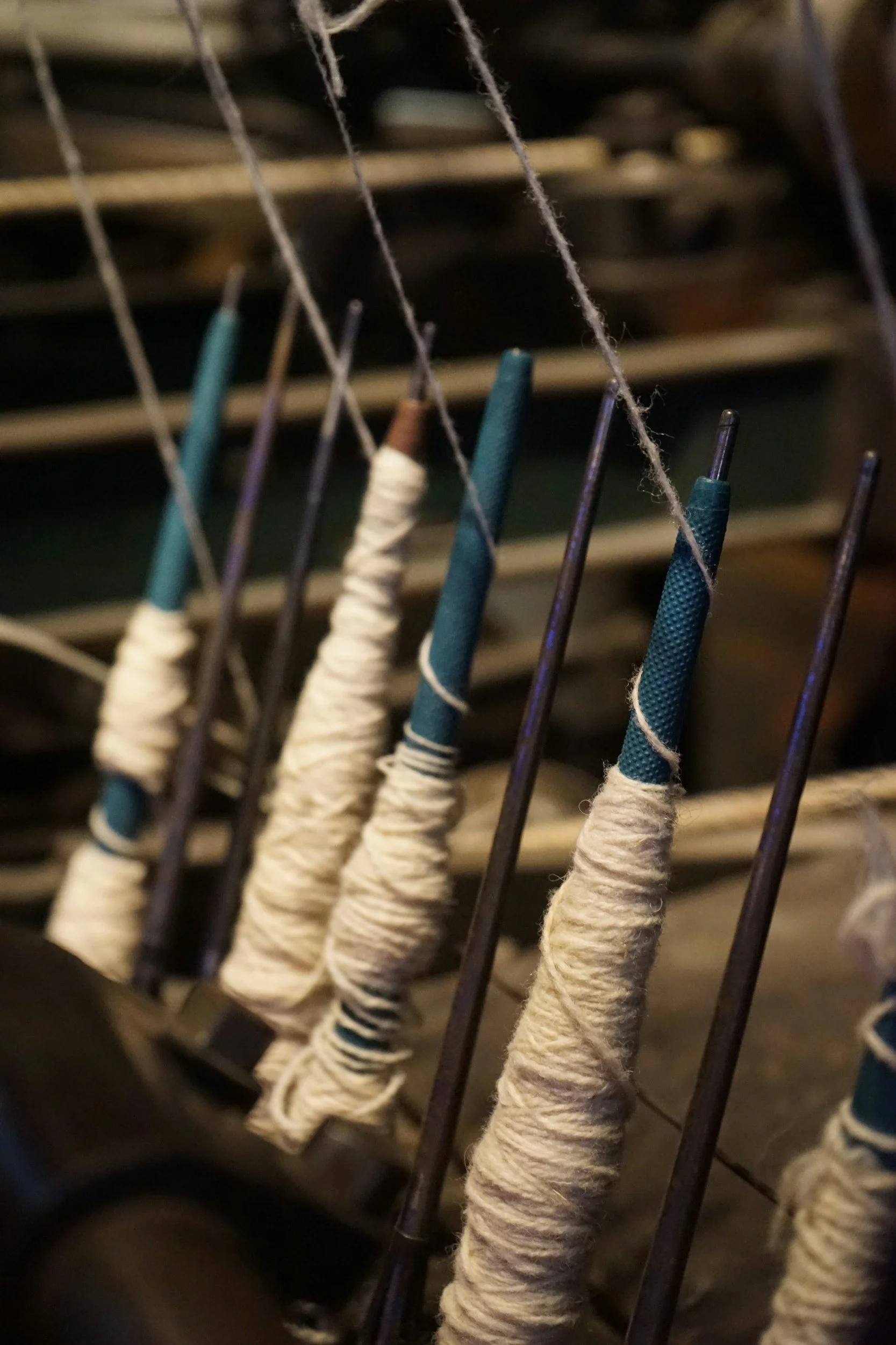 Several spools rotating around a central axis representing strategy and alignment.