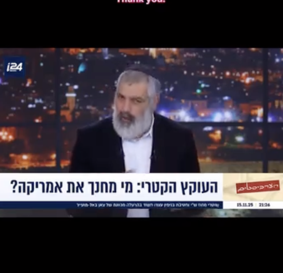 A male news anchor with gray hair and beard, wearing a black suit and white shirt, speaking on a television news program set with a cityscape backdrop at night.