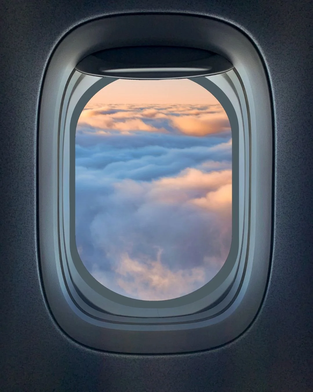 Hublo d'un avion - Vue  sur les nuages