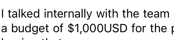Text that reads, "I talked internally with the team a budget of $1,000 USD for the p". from a UGC Creator