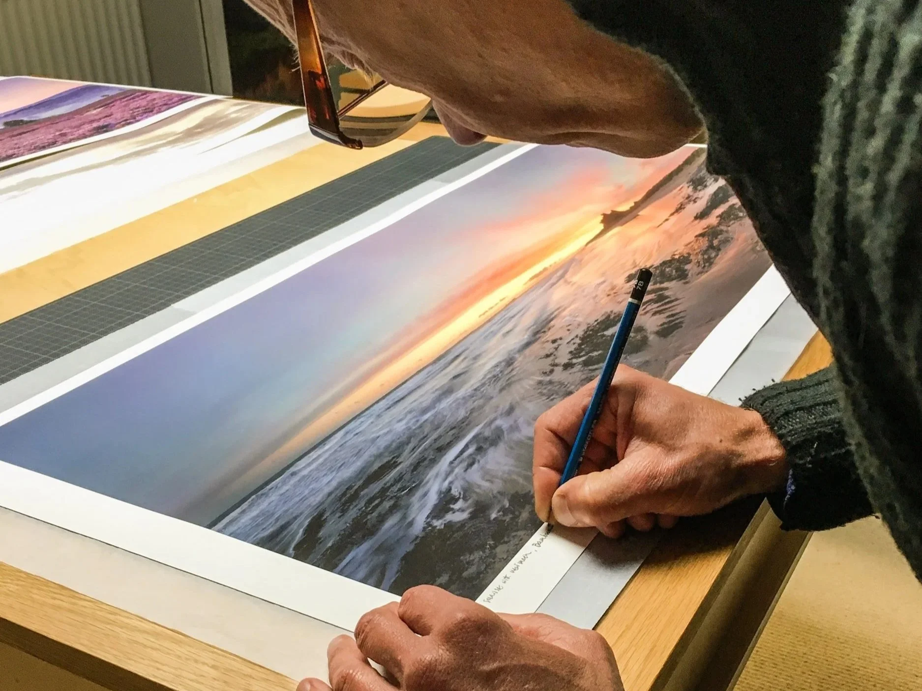 Joe Cornish signing one of his fine-art landscape photography prints.