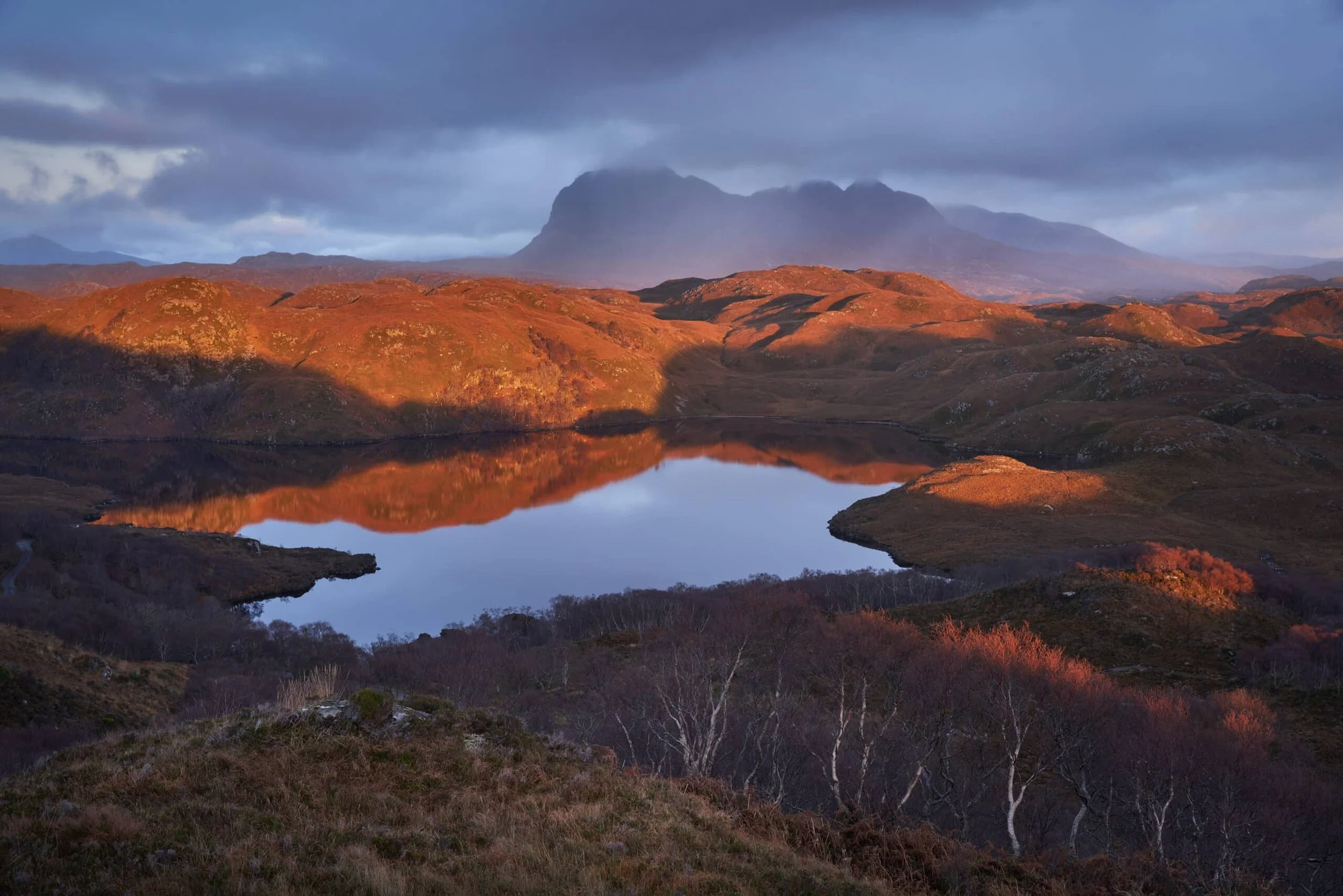 Rain_over_Suilven-scaled.jpg