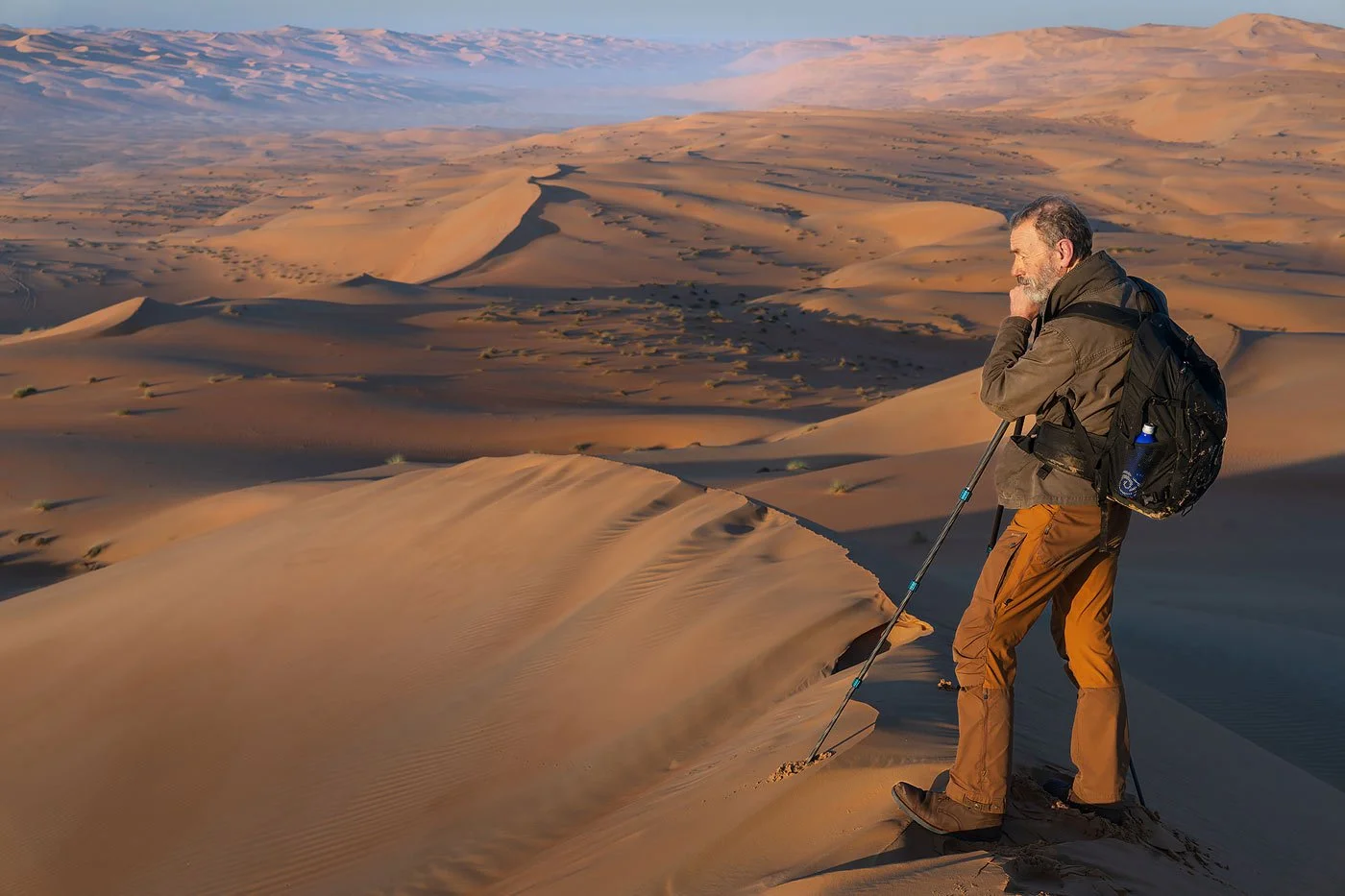 Photographer Joe Cornish in the desert at sunset.