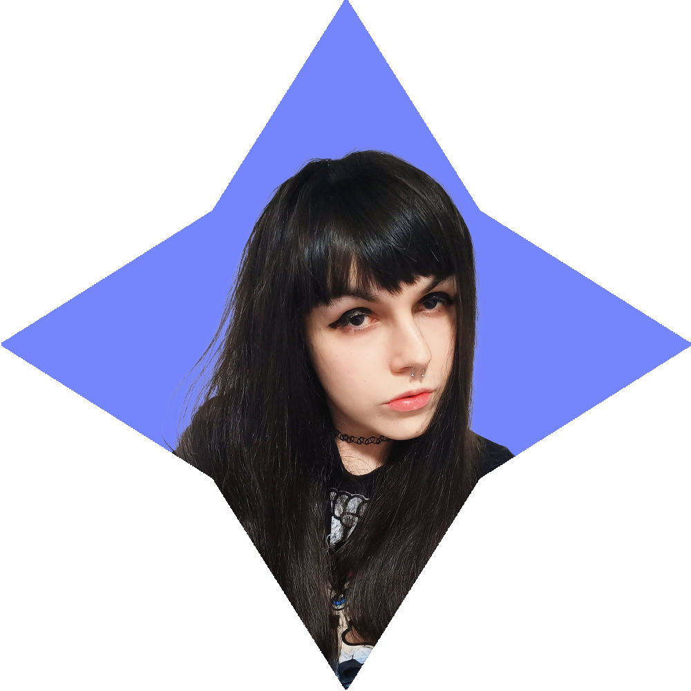 A woman with black hair and bangs.