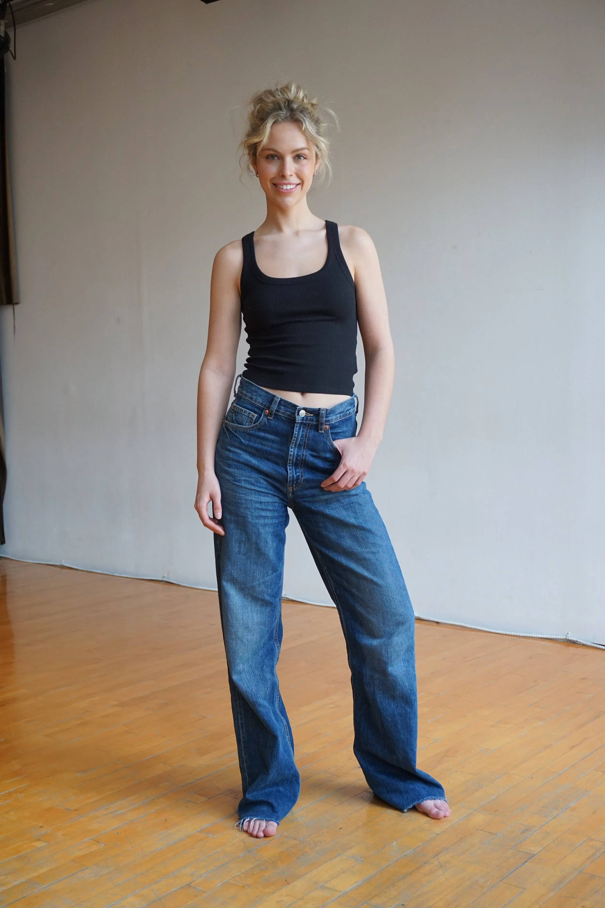 Full-length digital photo of a MTL Models MGMT model, captured in natural lighting to display silhouette and body proportions for agency review.