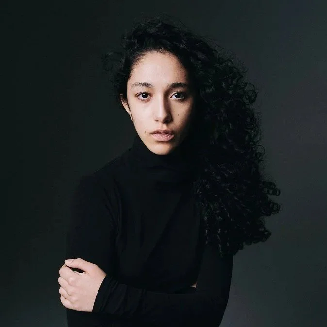 Colour editorial portrait of Montreal model Oana, featuring a natural yet elevated fashion look with soft lighting and a clean composition that highlights her features and presence for a professional modelling portfolio.