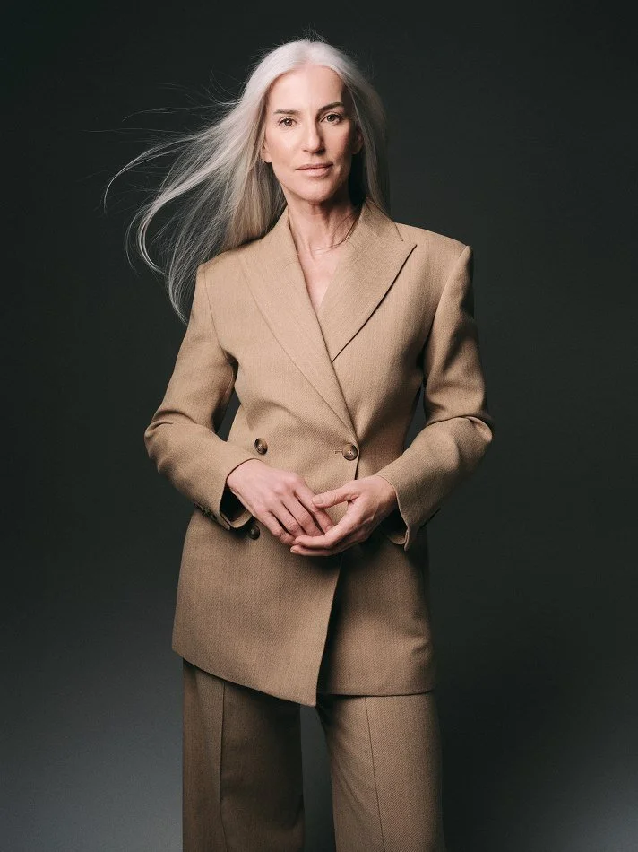 Main portfolio image of an older female model with silver hair from MTL Models MGMT, featuring natural lighting and a clean, professional composition that highlights her authentic beauty, presence, and modelling potential.