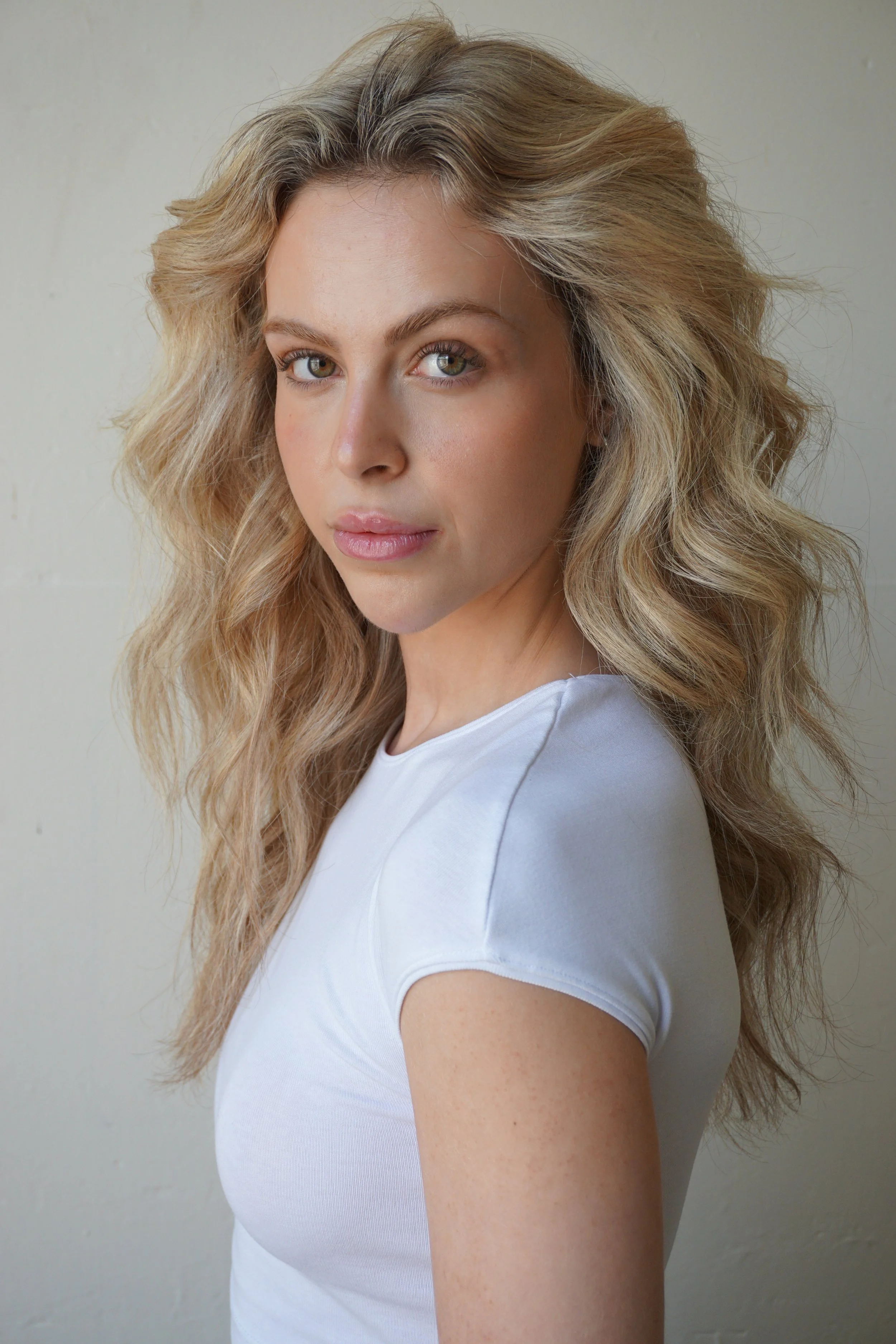 Full-length front-facing digital photo of a MTL Models MGMT model, wearing fitted neutral clothing in natural light to clearly show body proportions and posture.