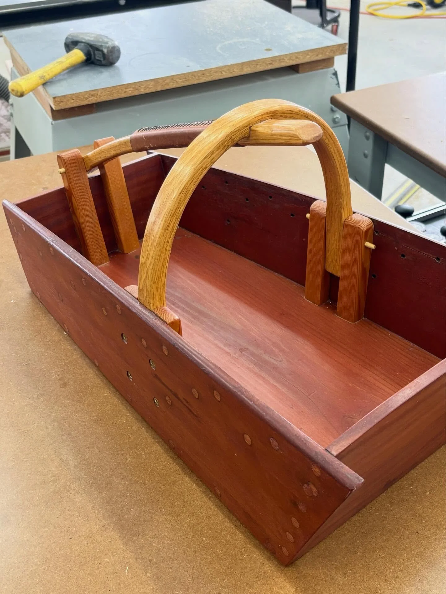 This was one of my first totes I made from reclaimed mahogany boat planking. It is a shape I dreamed of for years: an expanding &ldquo;bow&rdquo; and rising &ldquo;shear&rdquo; with a 3-point connection handle. I still have it because when I was done