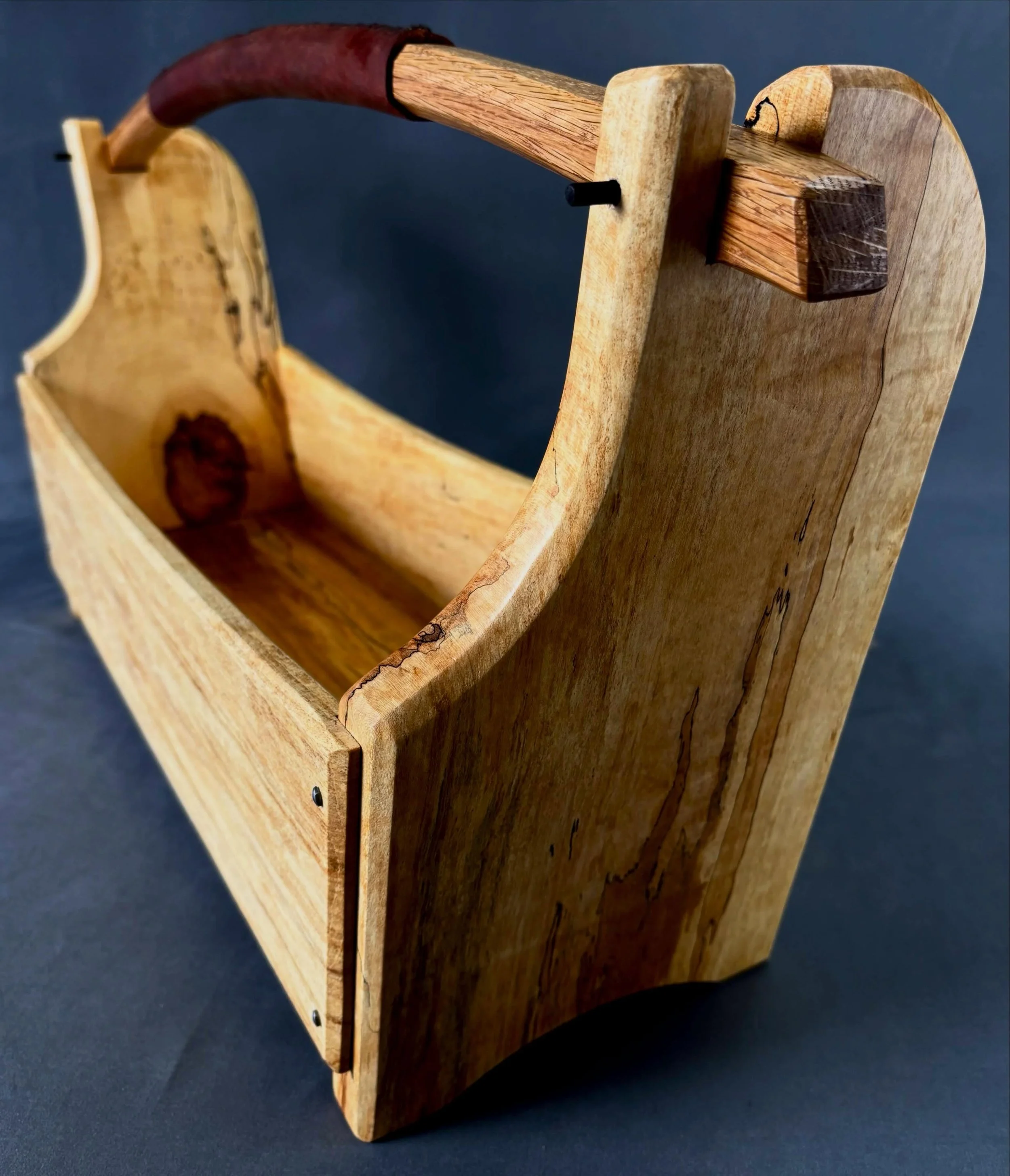 If you&rsquo;ve been seeing any of my recent stories, this won&rsquo;t be a surprise. One design from my brain and the wood from my yard. These will be available soon for purchase. Let me know what you think.

&hellip;Spalted maple tote with a leathe