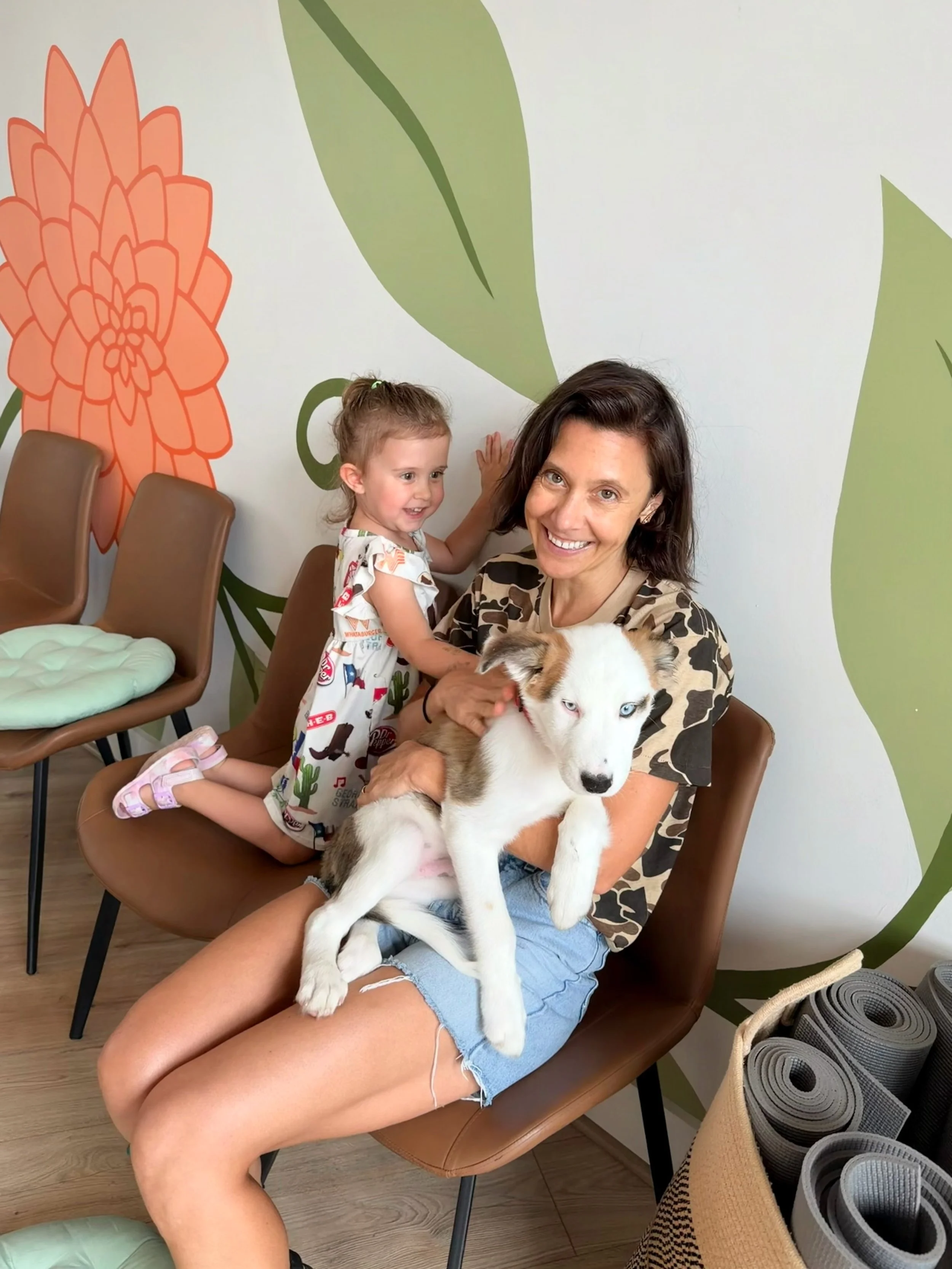 We have a Puppy Therapy success story! Adin, VCU professor; Tim, librarian; and their too-cool daughter, Margo, attended our Puppy Therapy event earlier this month. Within the first few minutes, they connected with a blue-eyed husky mix, Odysseus fro