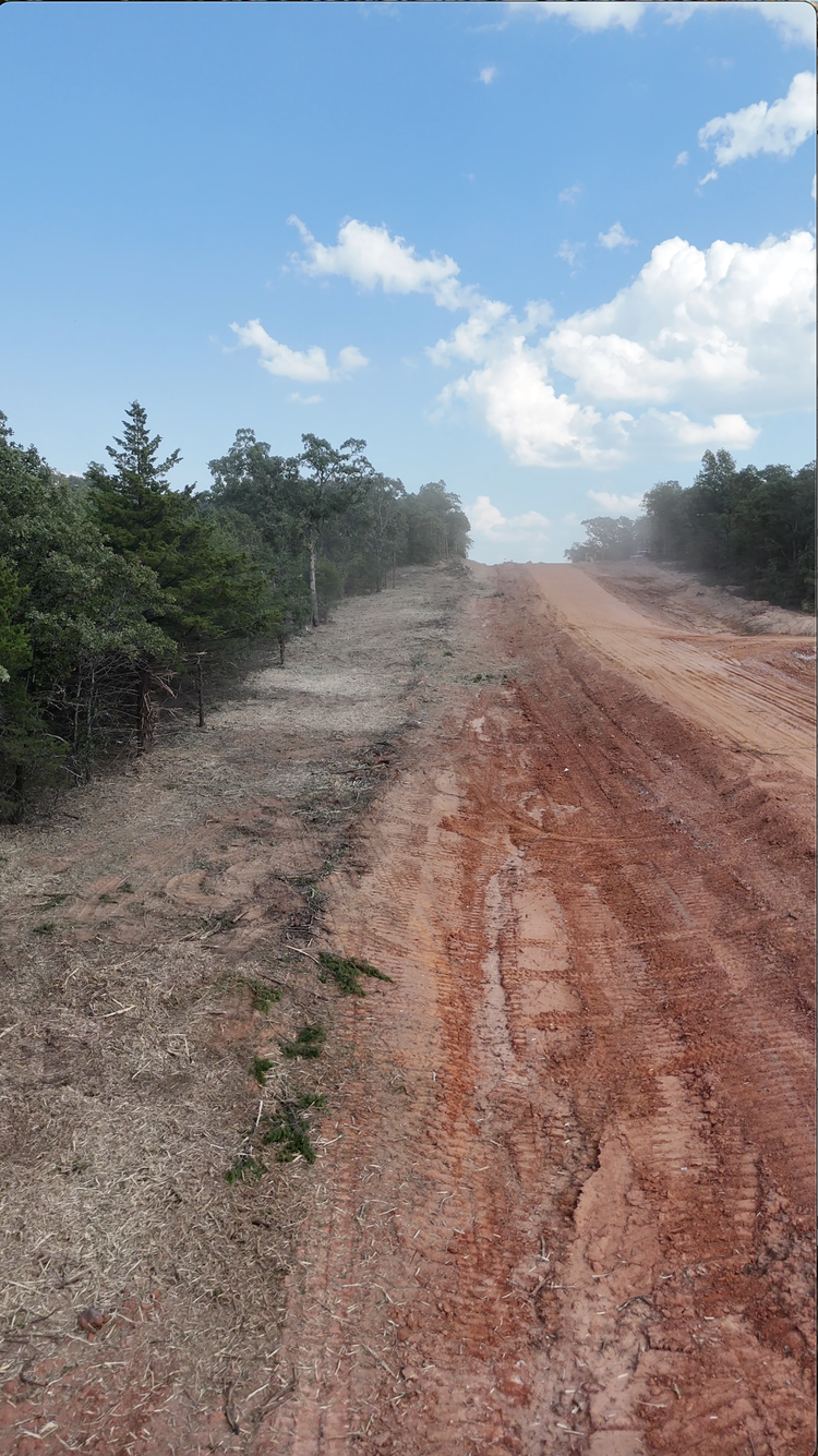 Oklahoma property after firebreak creation — cleared defensible space around structures