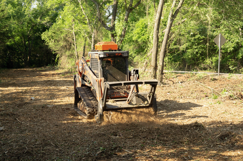 Root pulling on Oklahoma land clearing job
