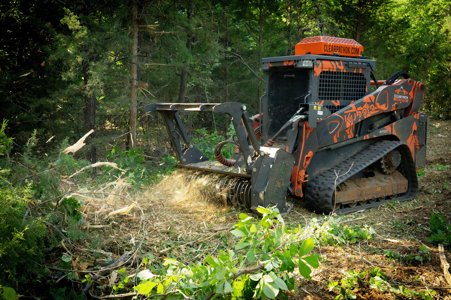 Forestry mulching equipment clearing cedar on Oklahoma land