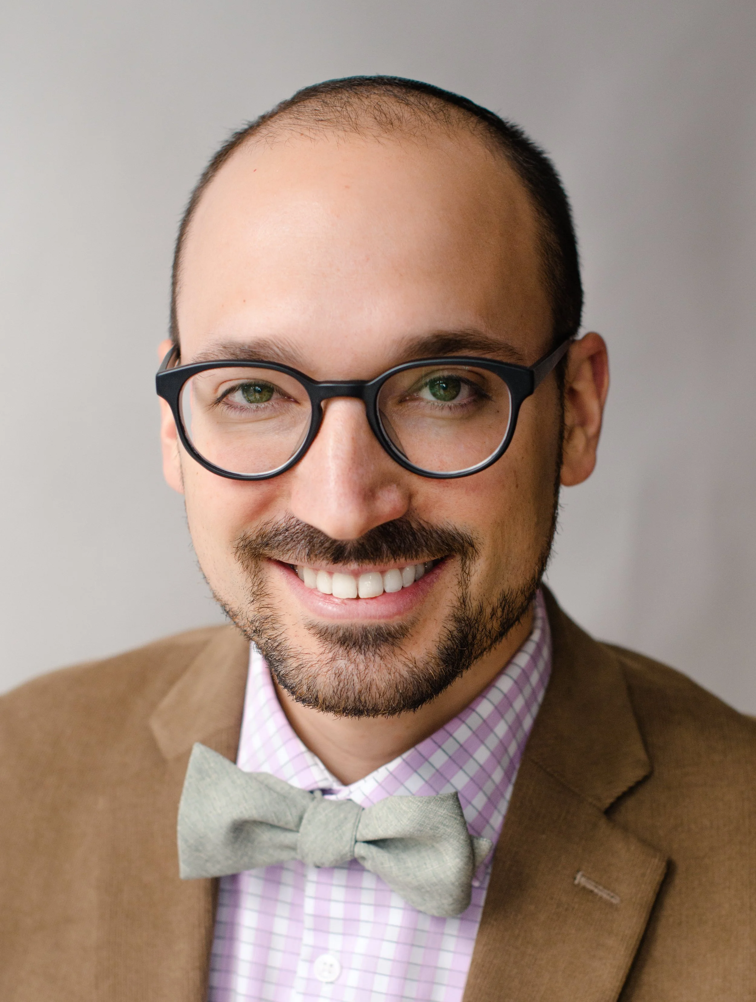 Professional headshot of Ethan Schwartz.