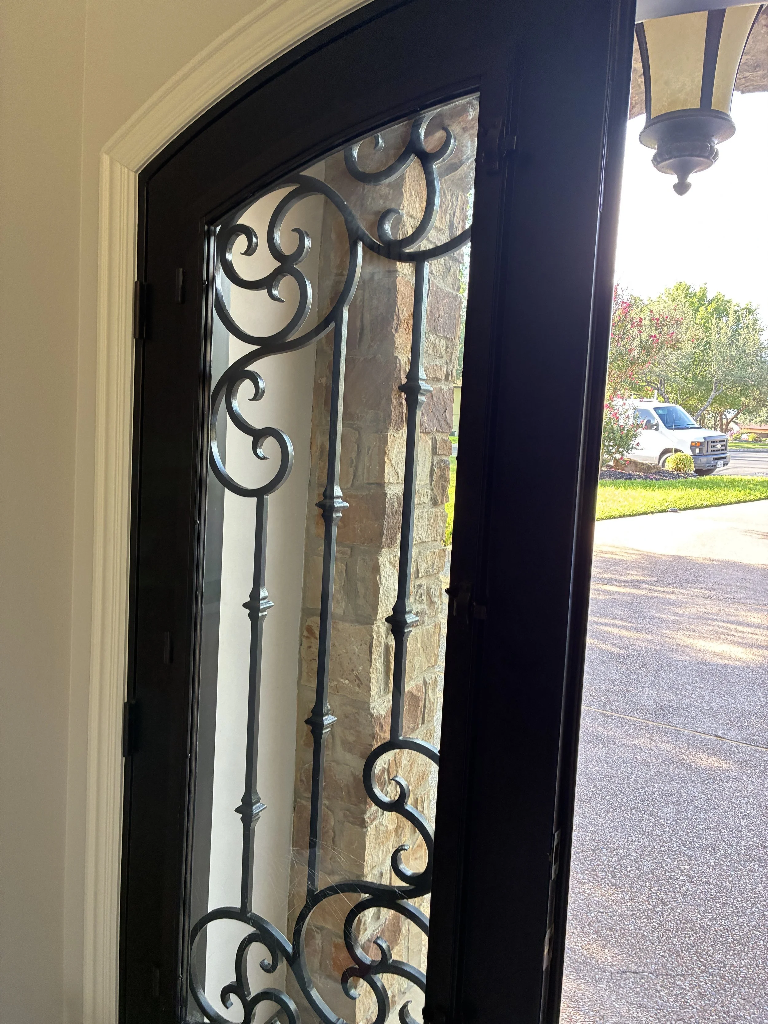 Decorative glass front door with privacy film applied