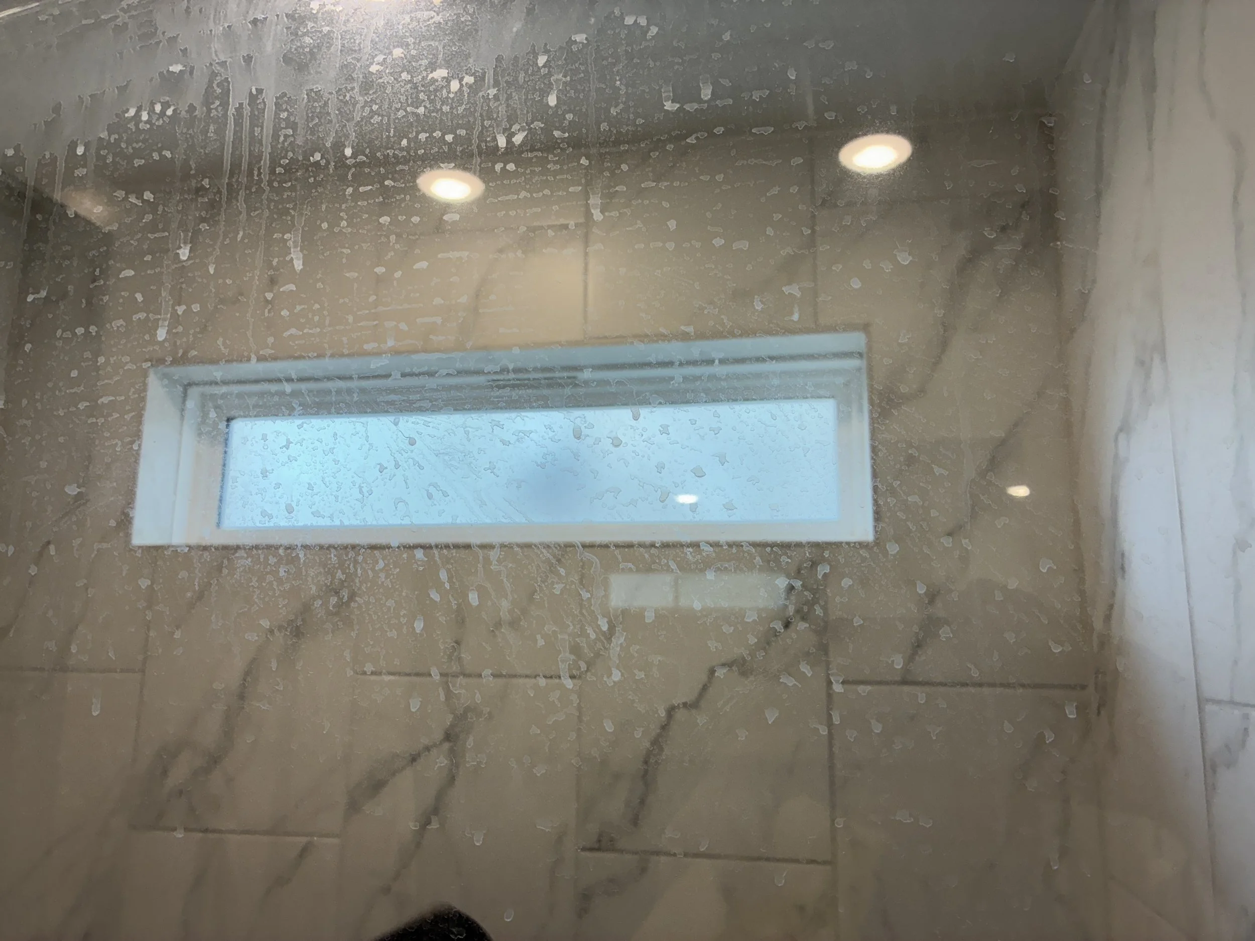 Decorative privacy film installed on a skylight window