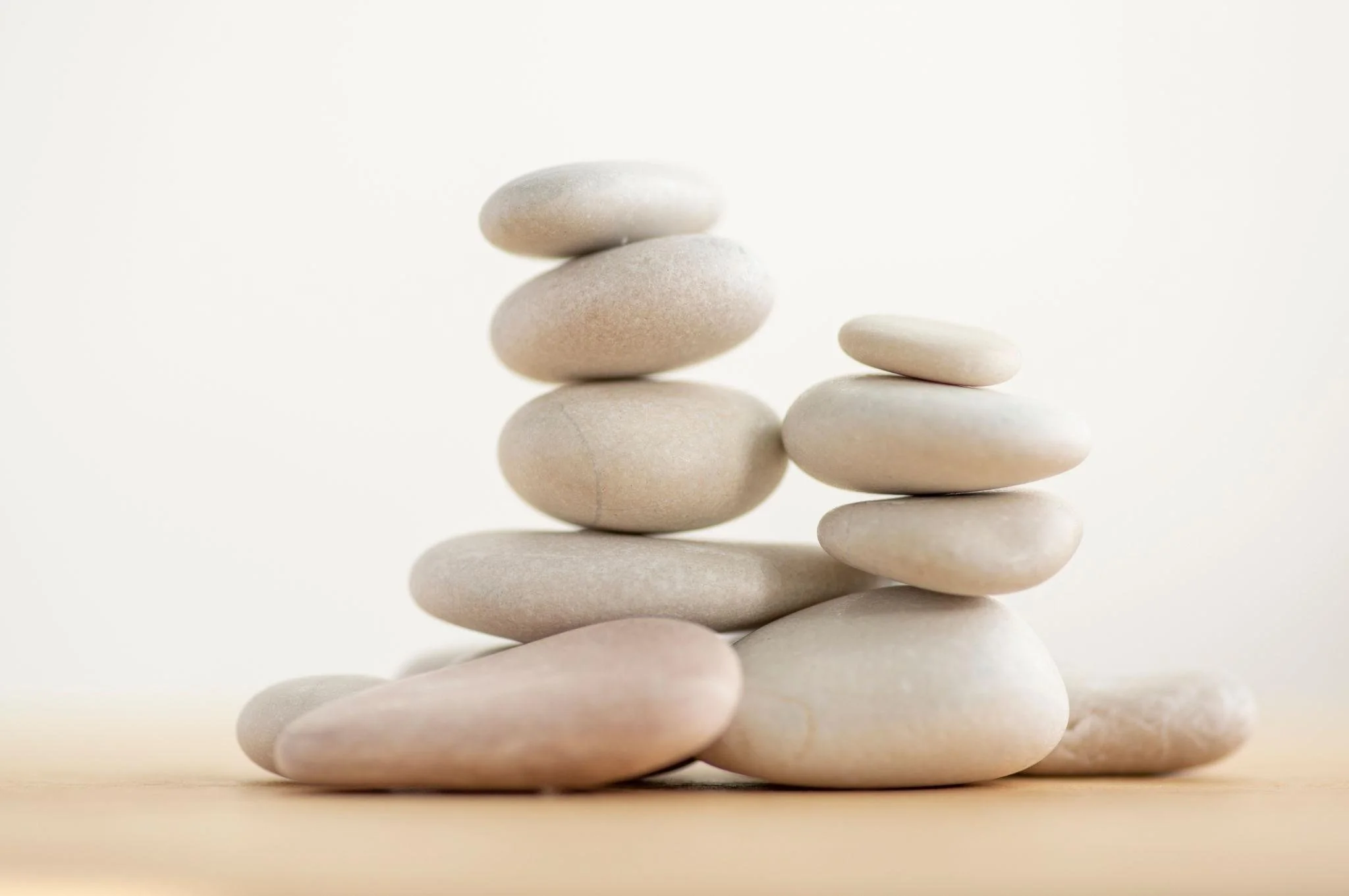 Balanced stones representing stability and grounded support.