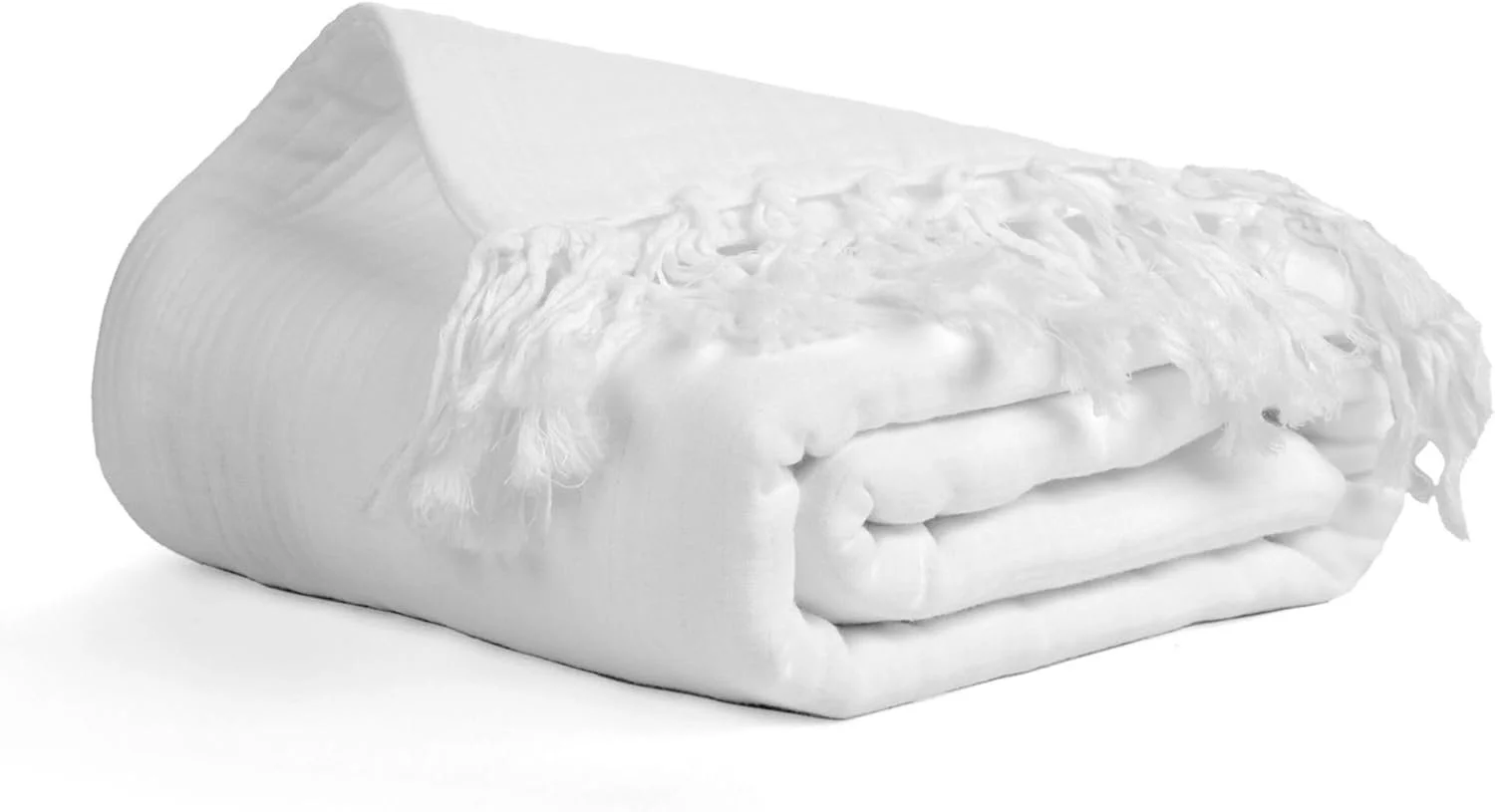 A rolled bundle of white fabric or bedding with one corner folded over, showing layered material.