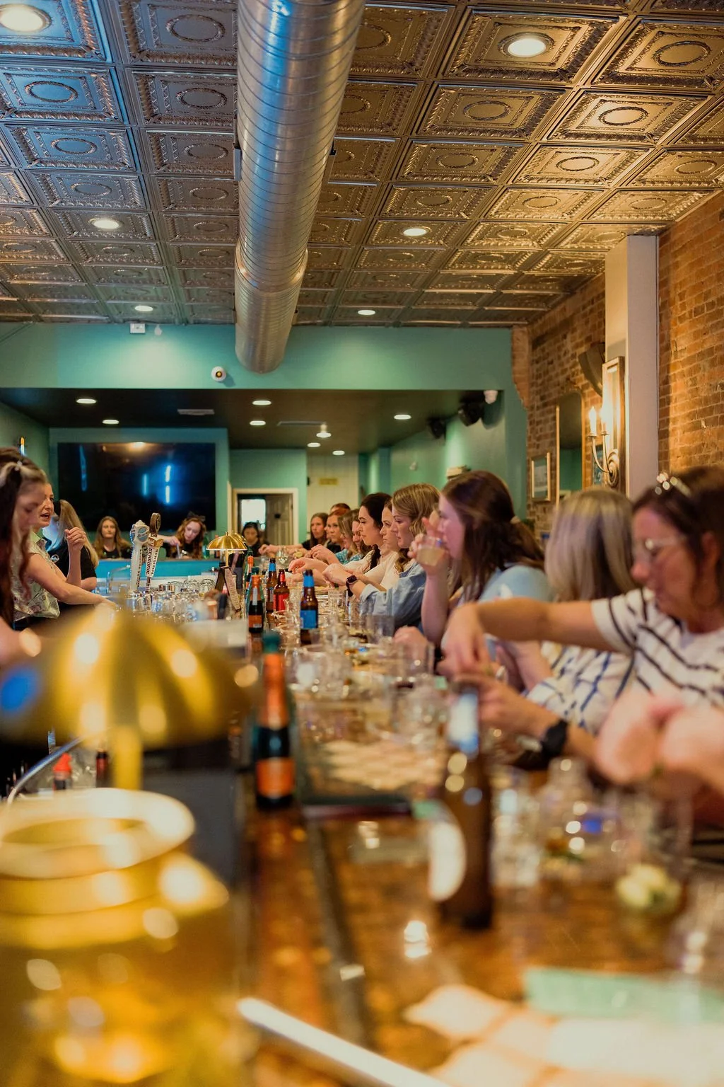 Women attending Highland Stables Social Club event in Bowling Green Kentucky