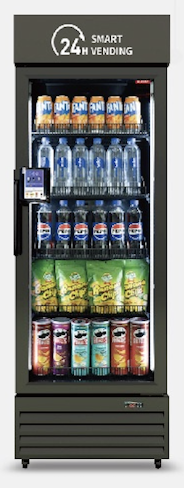 A vending machine with a sign that reads 24-hour smart vending. Inside, there are bottles of water, cans of energy drinks, and cans of soda arranged on shelves. Smart micro market vending solution for Tacoma apartment complexes