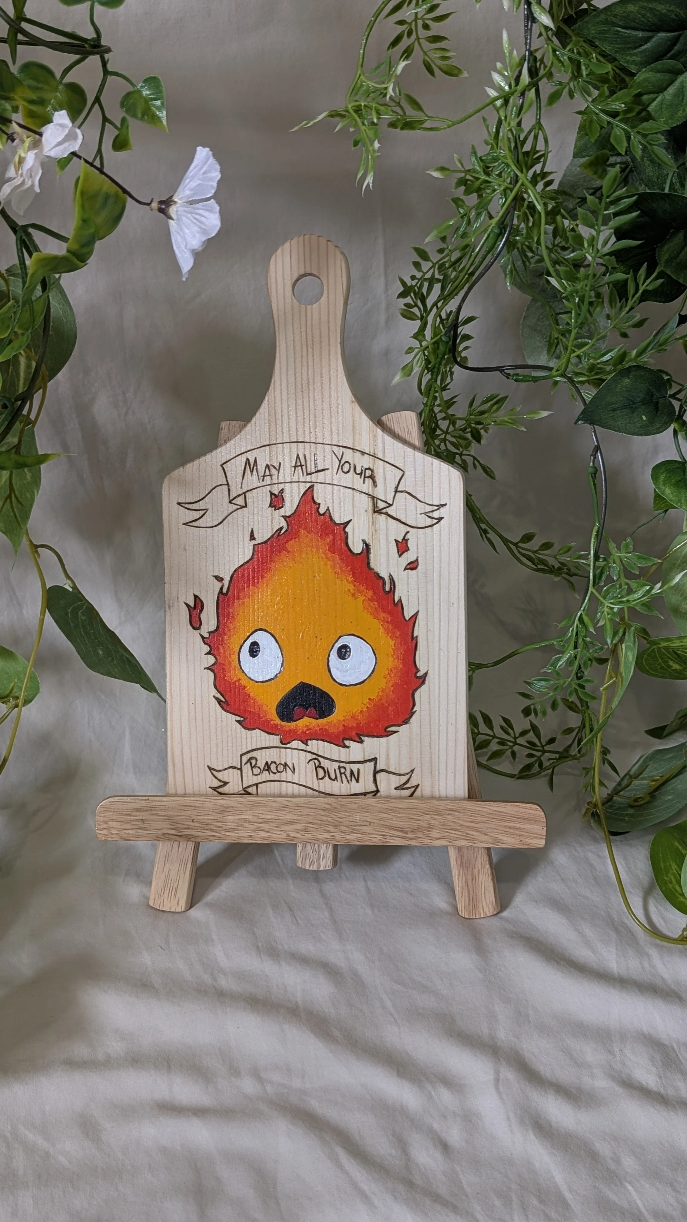 Calcifer painted wood burning