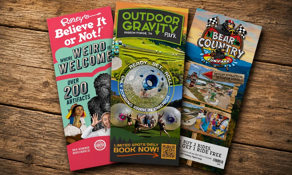 Three colorful rack cards for attractions, one for Ripley's Believe It or Not!, one for Outdoor Gravity Park, and one for Bear Country Fun Park, Website Design Gatlinburg