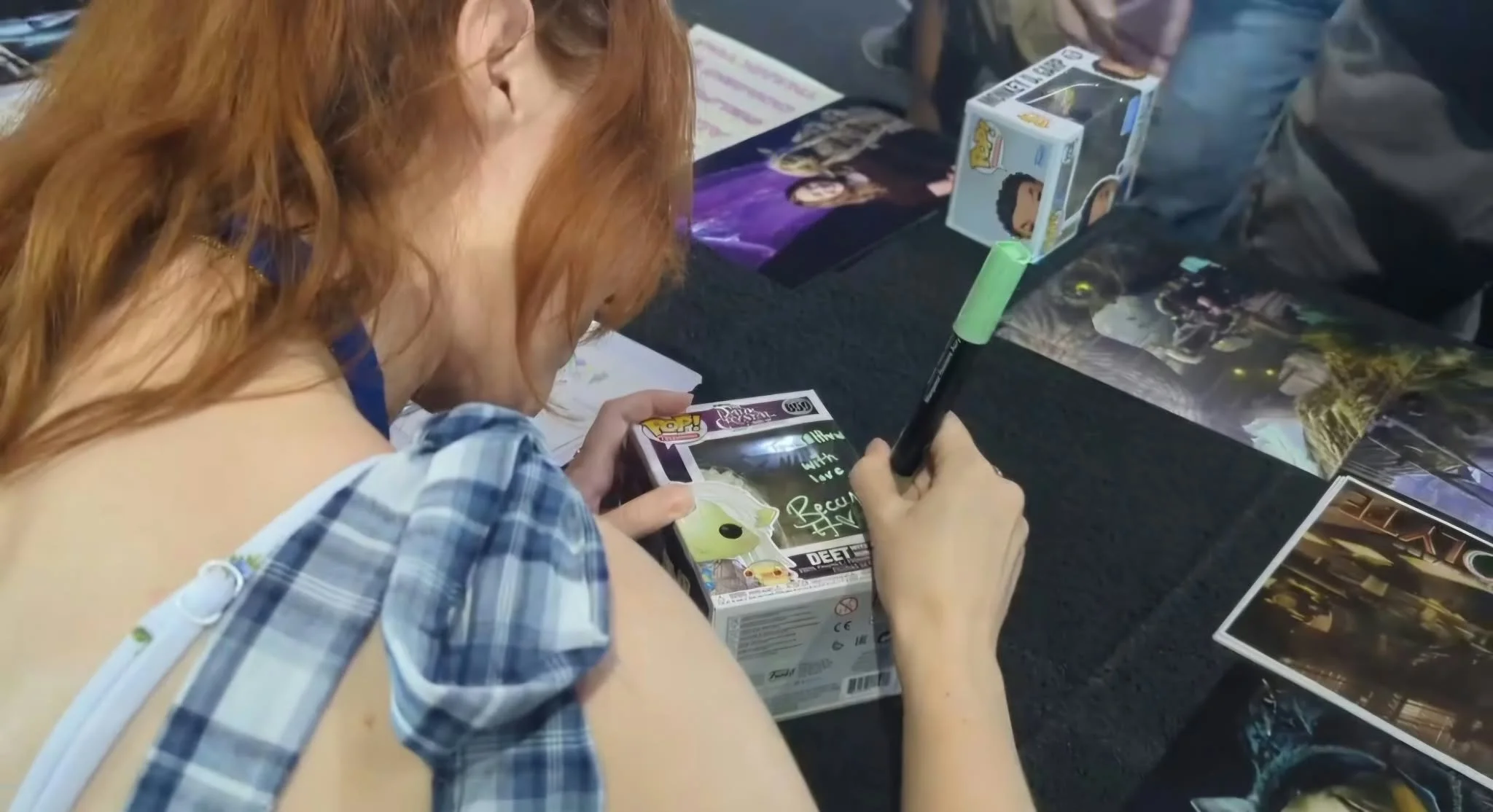 Beccy Henderson signing autographs at Malta Comic Con