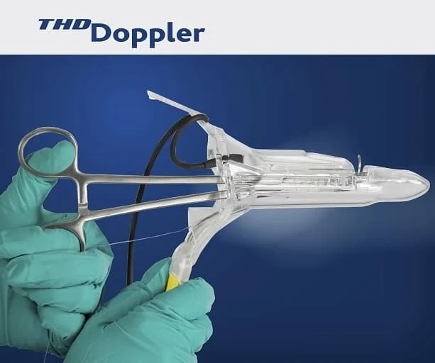 A medical device called THD Doppler, used for detecting fetal heartbeats, with a healthcare professional in green gloves holding a transducer probe.