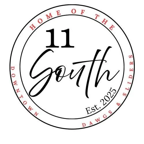 A circular logo with the word "South" in the center, surrounded by the text "Home of the Down Syndrome & Sliders,".Established 2025.