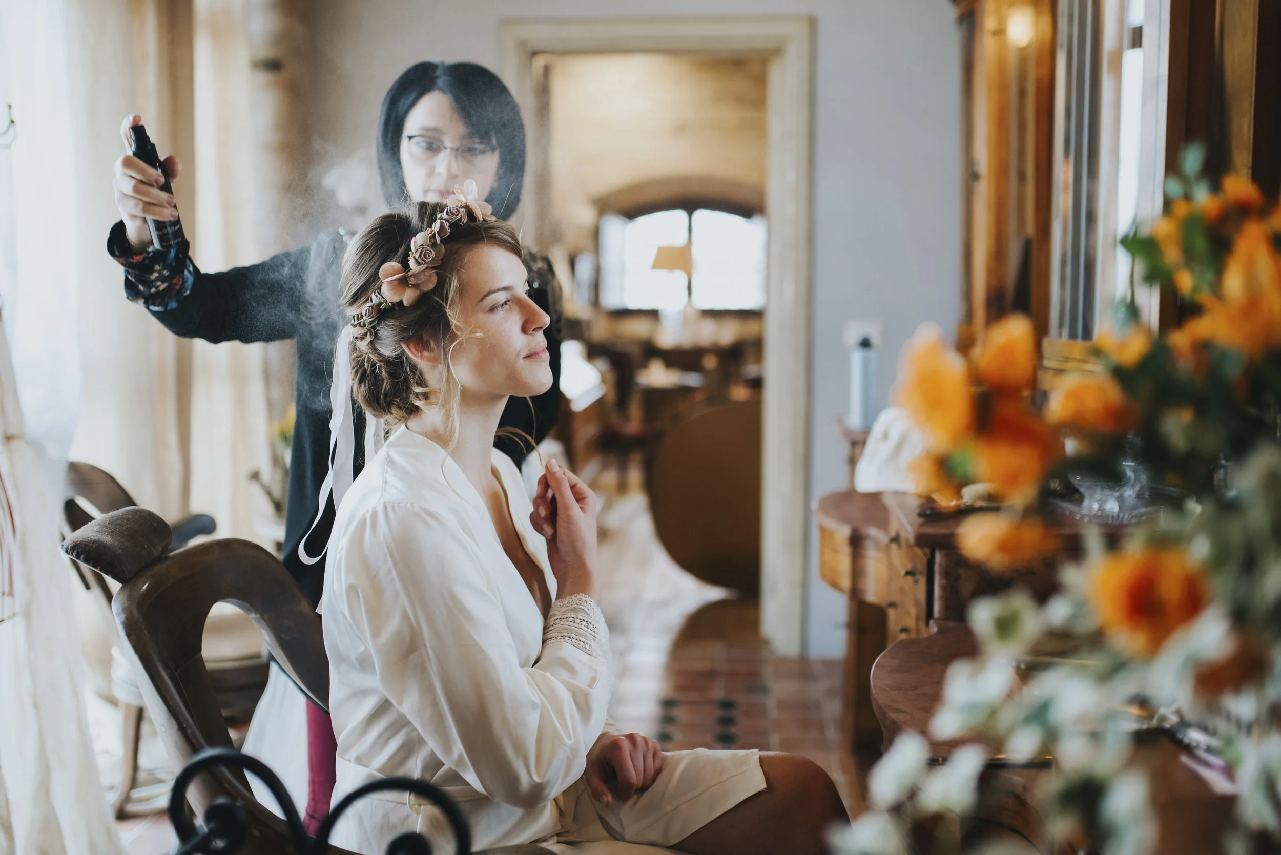 woman-getting-ready-with-hair-stylist-before-weddi-2026-03-25-01-19-17-utc.jpg