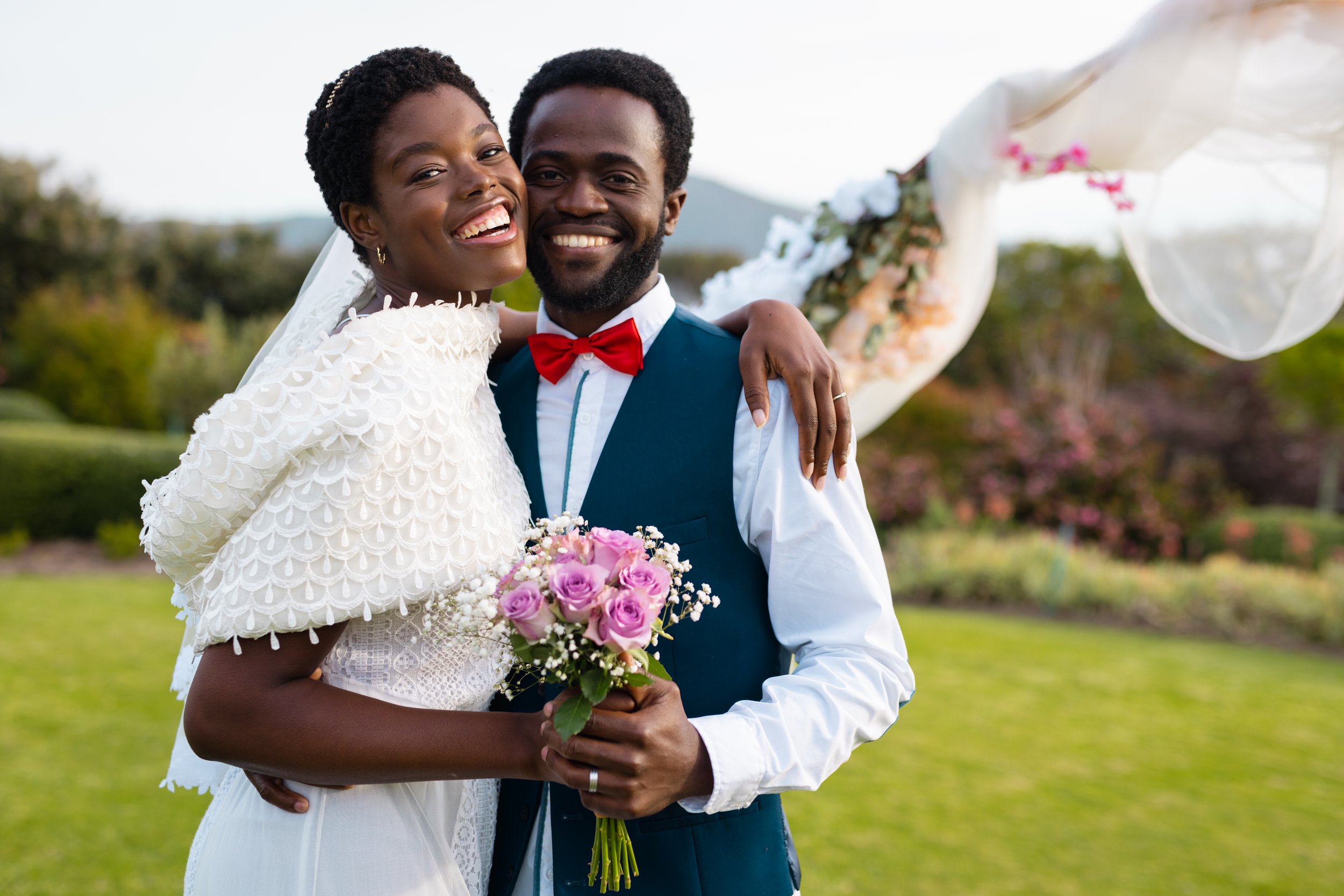 joyful-couple-celebrating-their-wedding-outside-2026-03-25-00-51-34-utc.jpg