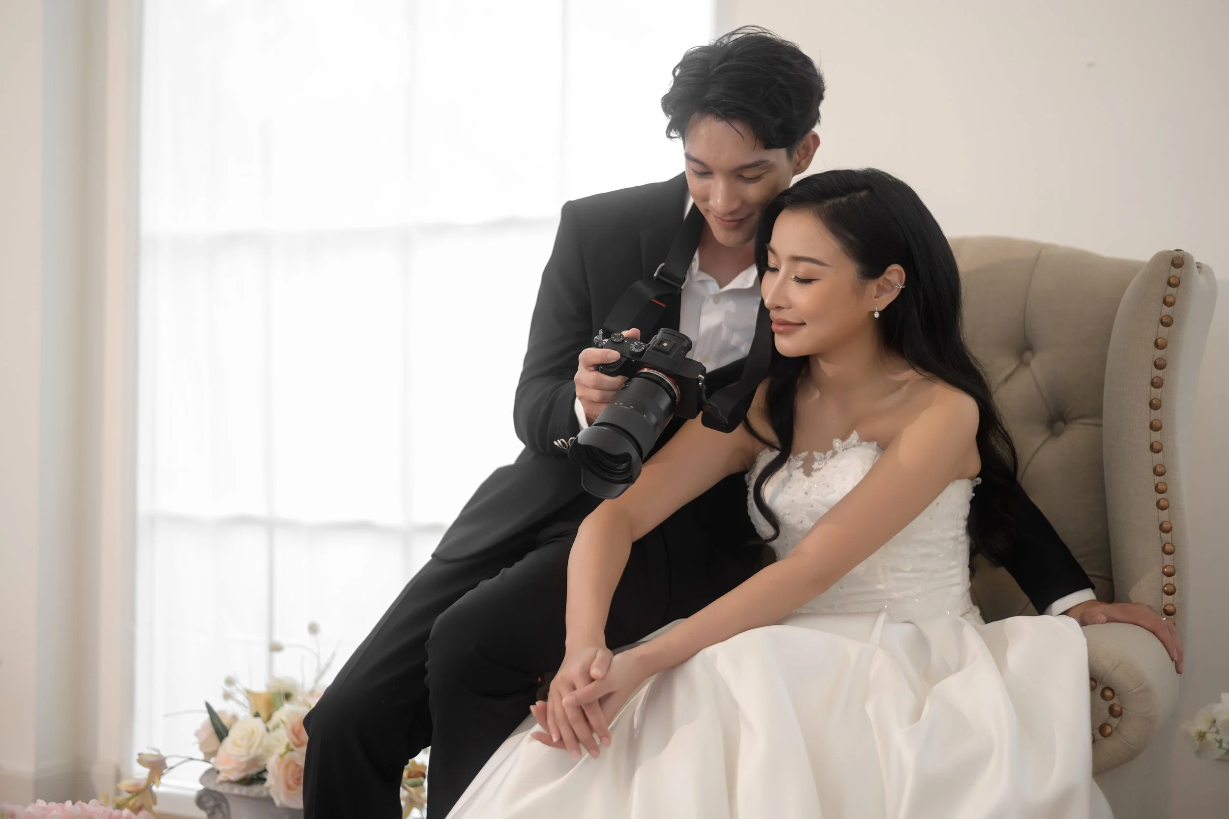 romantic-couple-celebrating-wedding-with-camera-2026-03-16-04-25-51-utc.jpg