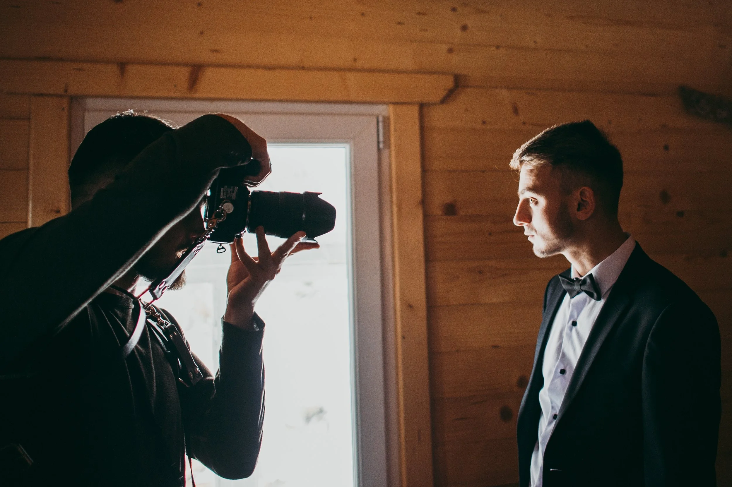 photographer-taking-photo-of-young-man-in-suit-2026-03-13-04-24-40-utc.jpg