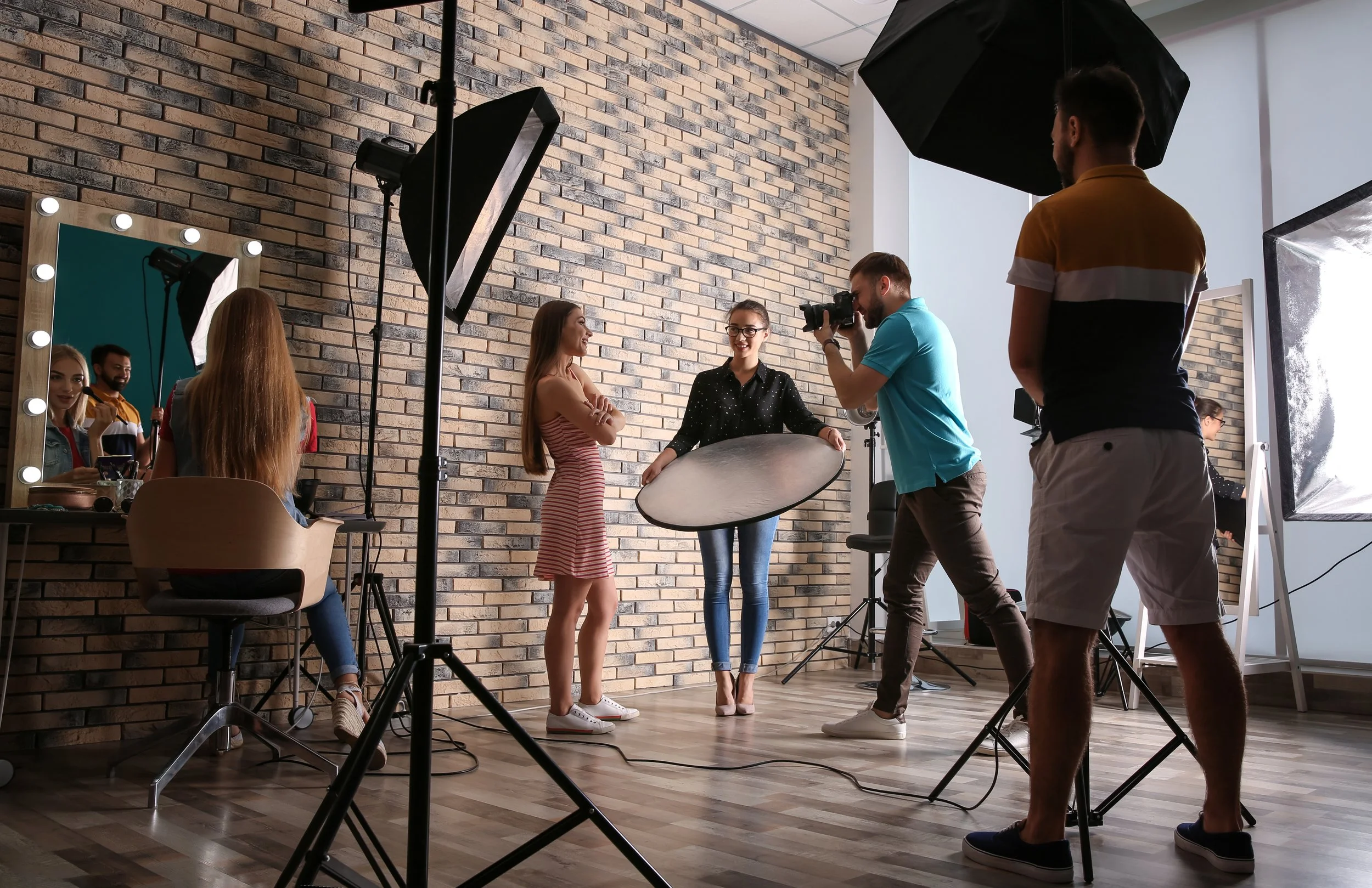 professional-team-working-with-model-in-photo-stud-2026-03-27-02-56-31-utc.jpg