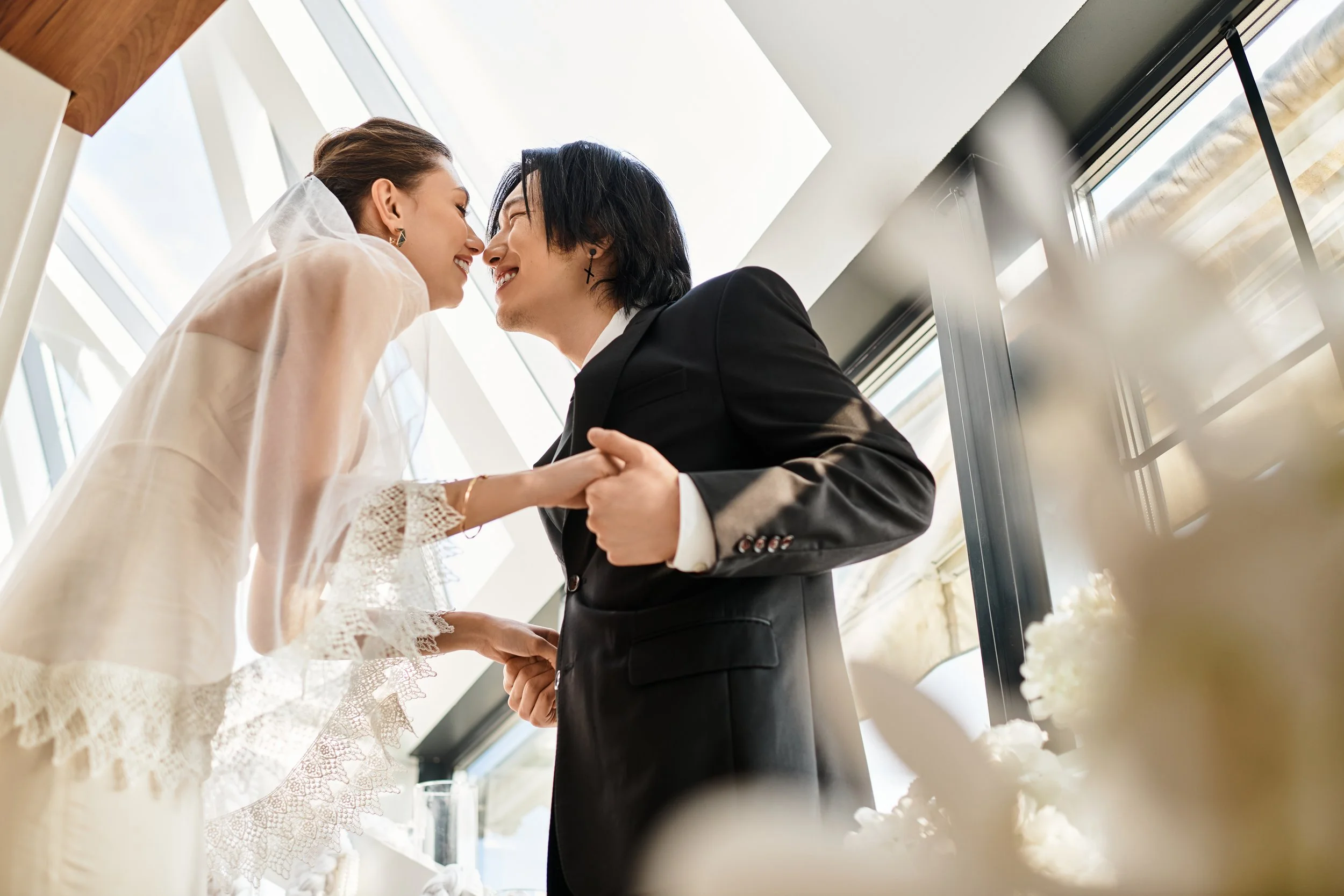 affectionate-couple-holding-hands-on-wedding-day-2026-01-09-11-31-07-utc.jpg