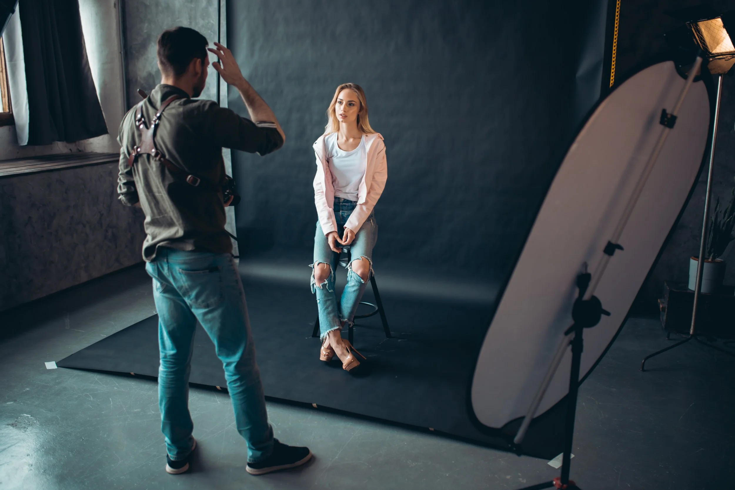 woman-posing-for-photographer-in-studio-2026-01-09-06-19-55-utc.jpg