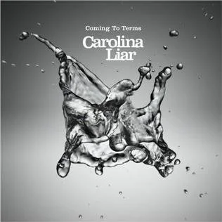 Black and white image of a splash of liquid shot in midair with text that says 'Coming To Terms' and 'Carolina Liar'.