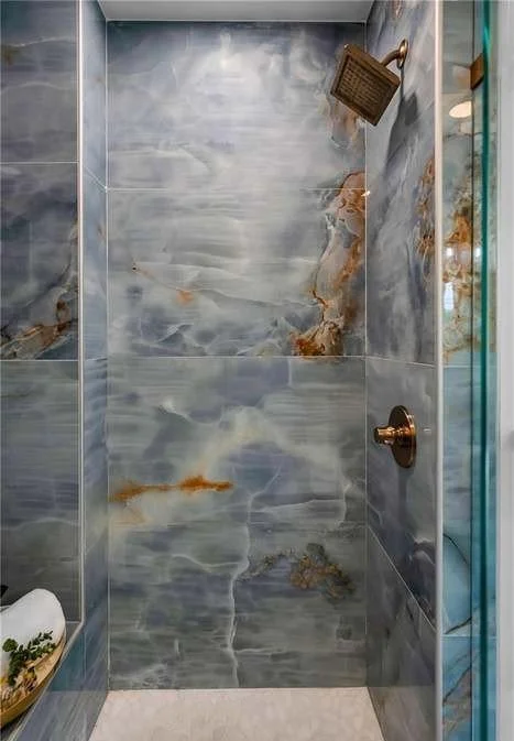 Bold large-format porcelain tile that delivers the high-end aesthetic you want — without the high-end price.