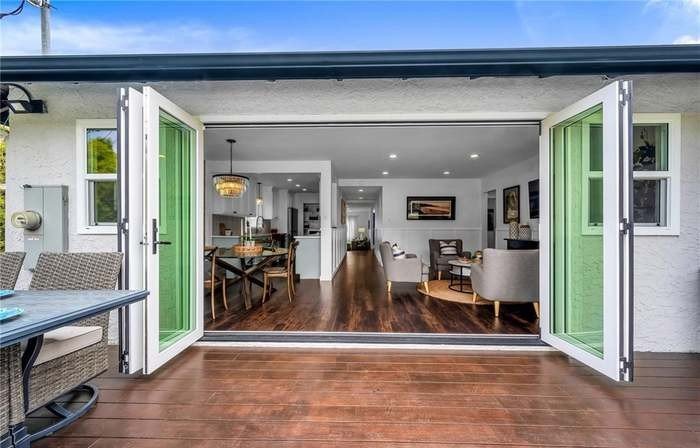 Expansive bifold doors that blur the line between inside and out — Southern California living at its best.
