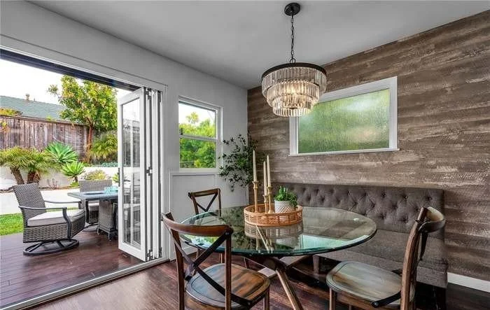 Gather for family dinners while the tranquility of your own backyard sets the mood.
