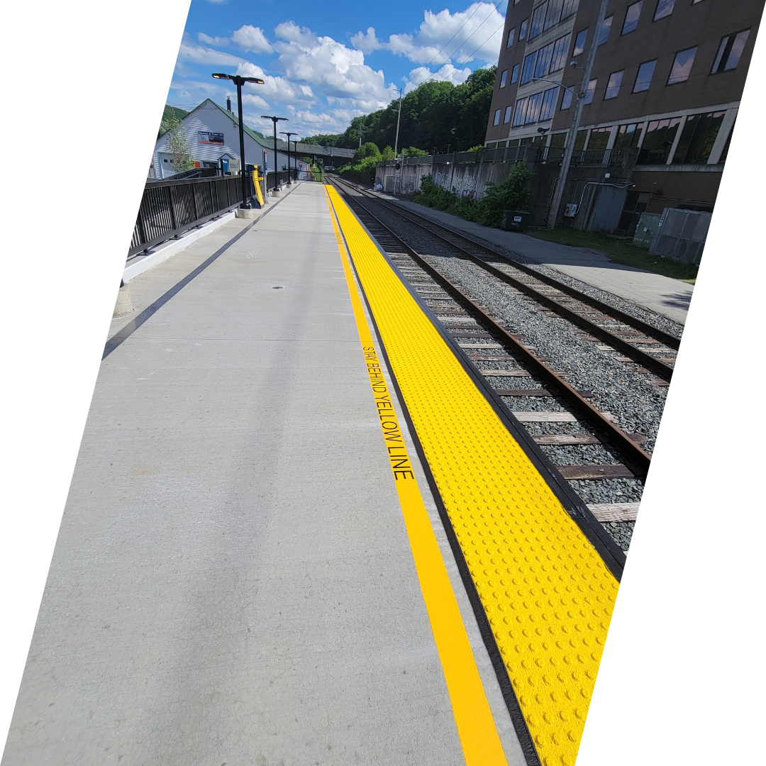 train tracks with freshly painted yellow line in brattleboro vt