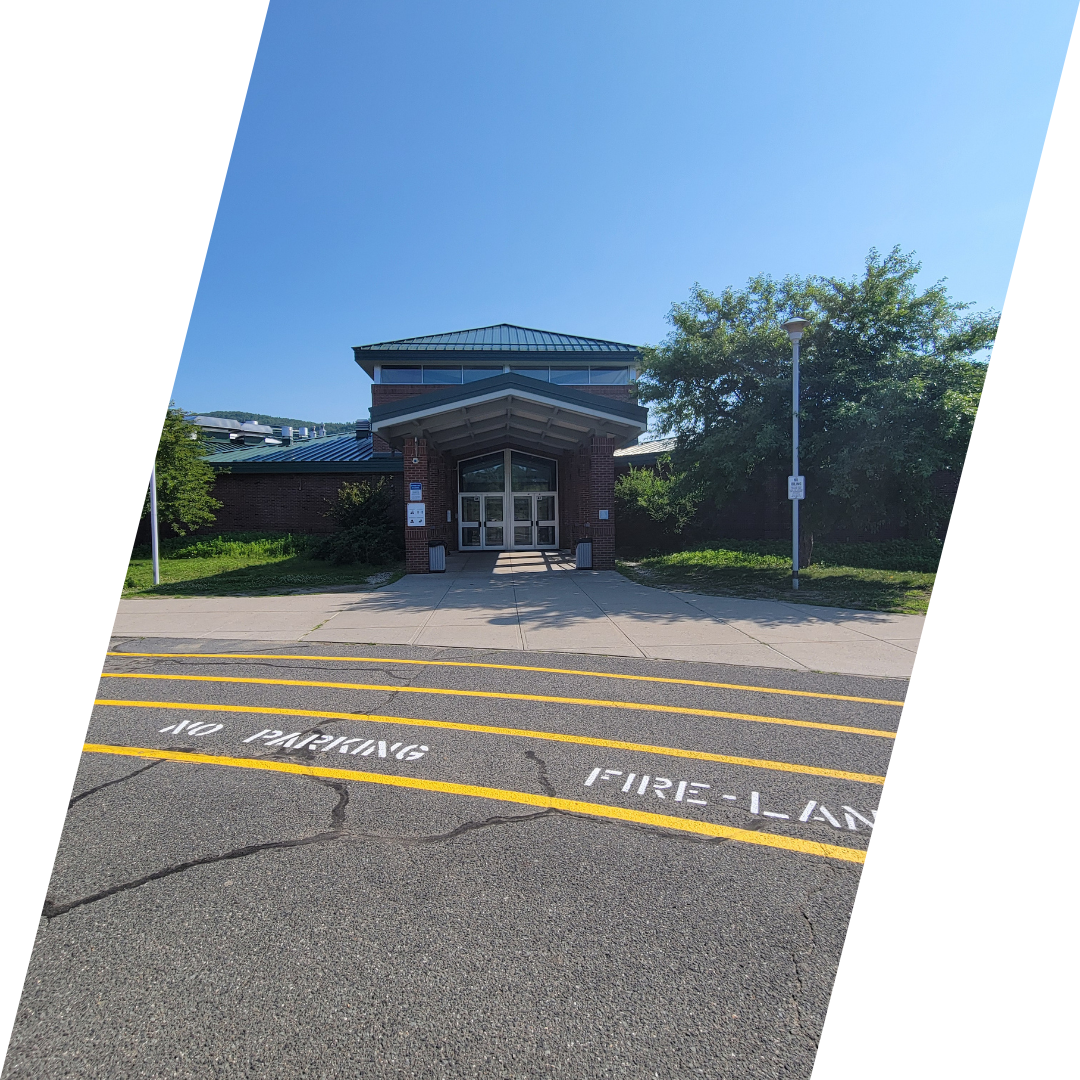 Fire lane and visitor parking near building entrance