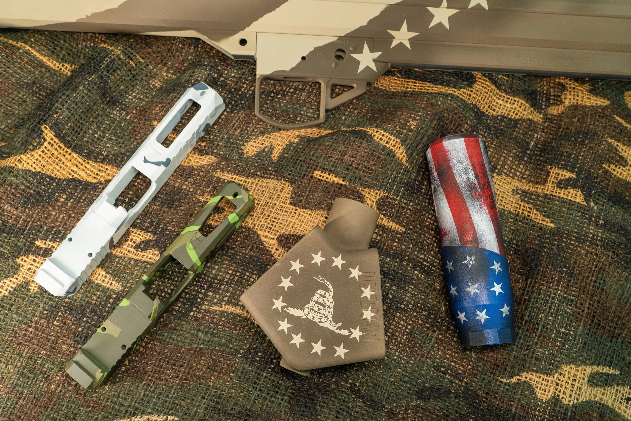 A selection of parts customized with Cerakote at Tactical Penguin in Salt Lake City