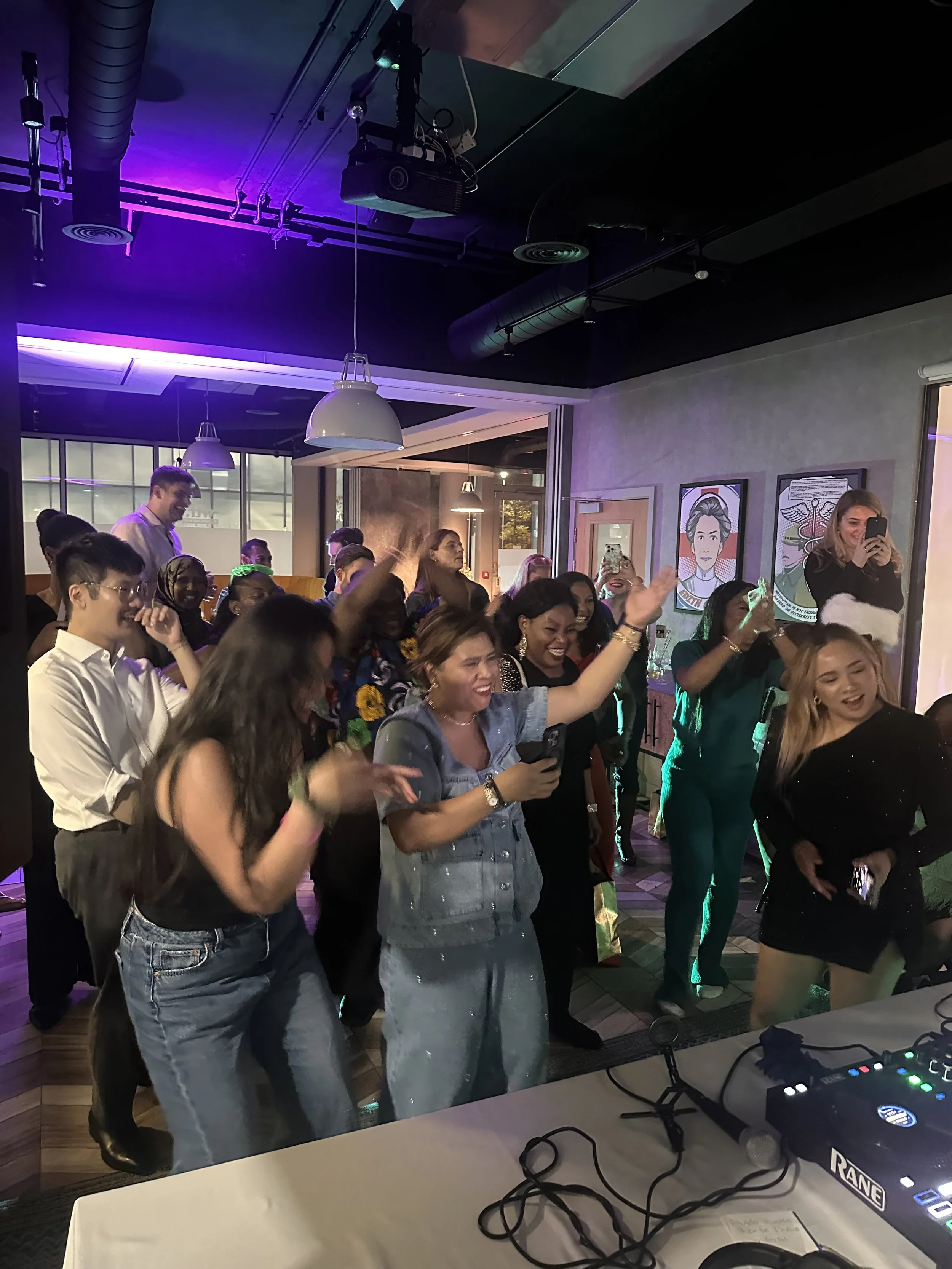 Guests dancing at a private party with Lucky Evi DJing in London