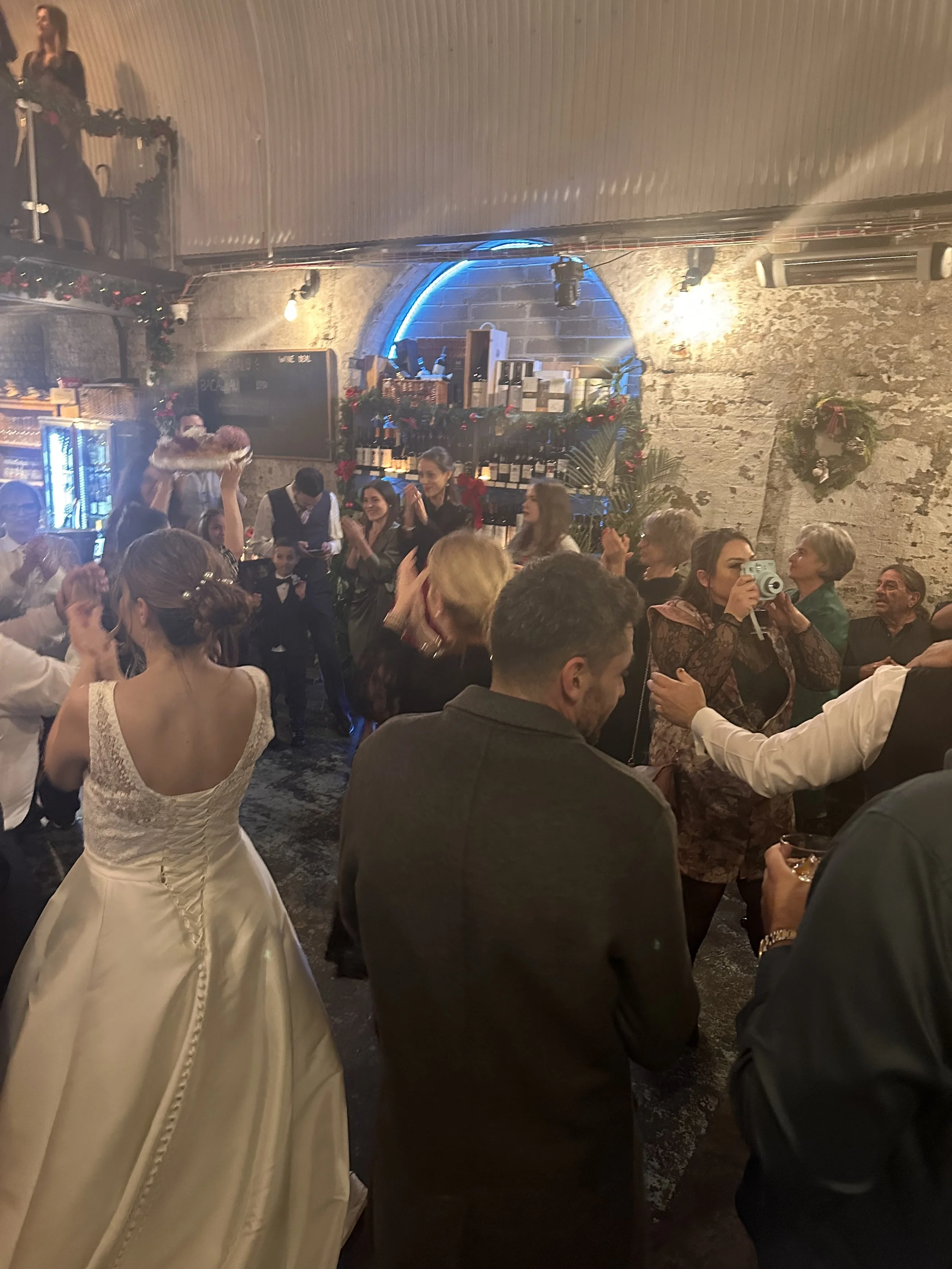 Bride and guests dancing at London wedding with Lucky Evi DJing