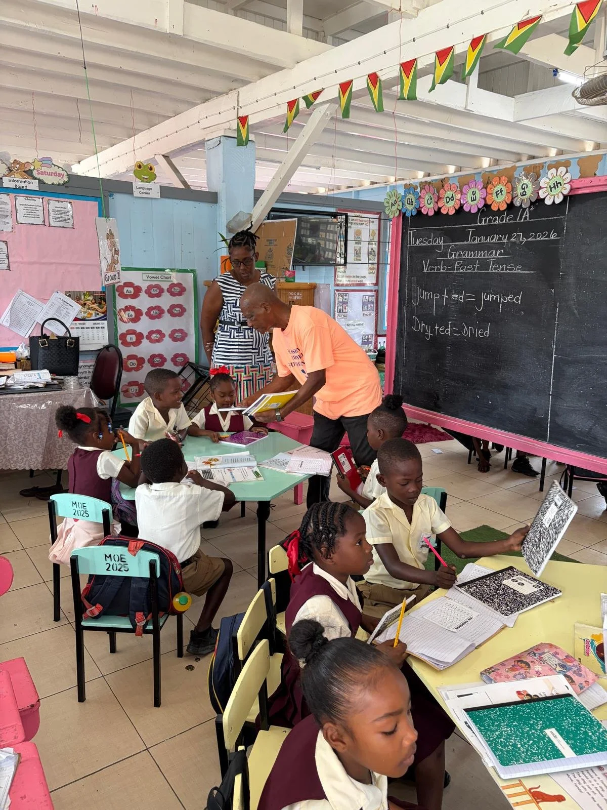 Sharing supplies, smiles, and hope with students at No. 29 Primary School.