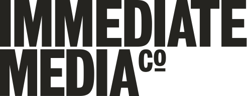 Close-up of black text on a dark background reading "IMMEDIATE MED A CO".